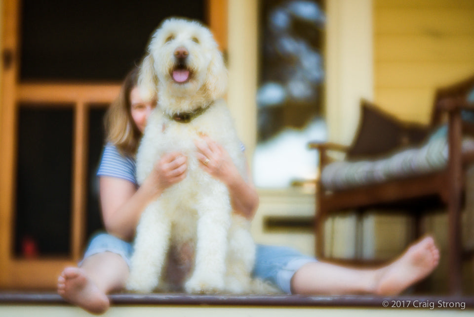 photo by Craig Strong woman with dog shot with Lensbaby Velvet 56 at F/1.6