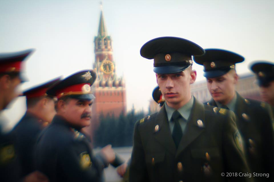 men in uniform military hats and green suit and tie in front of palace selective focus Lensbaby History Part 2