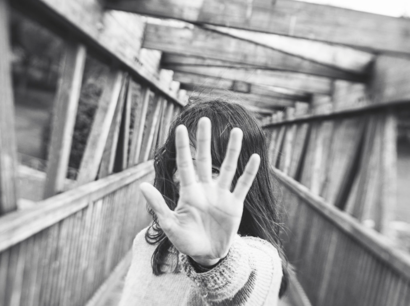 woman with brown hair hand in front of camera wooden bridge five portrait Lensbaby featured photos