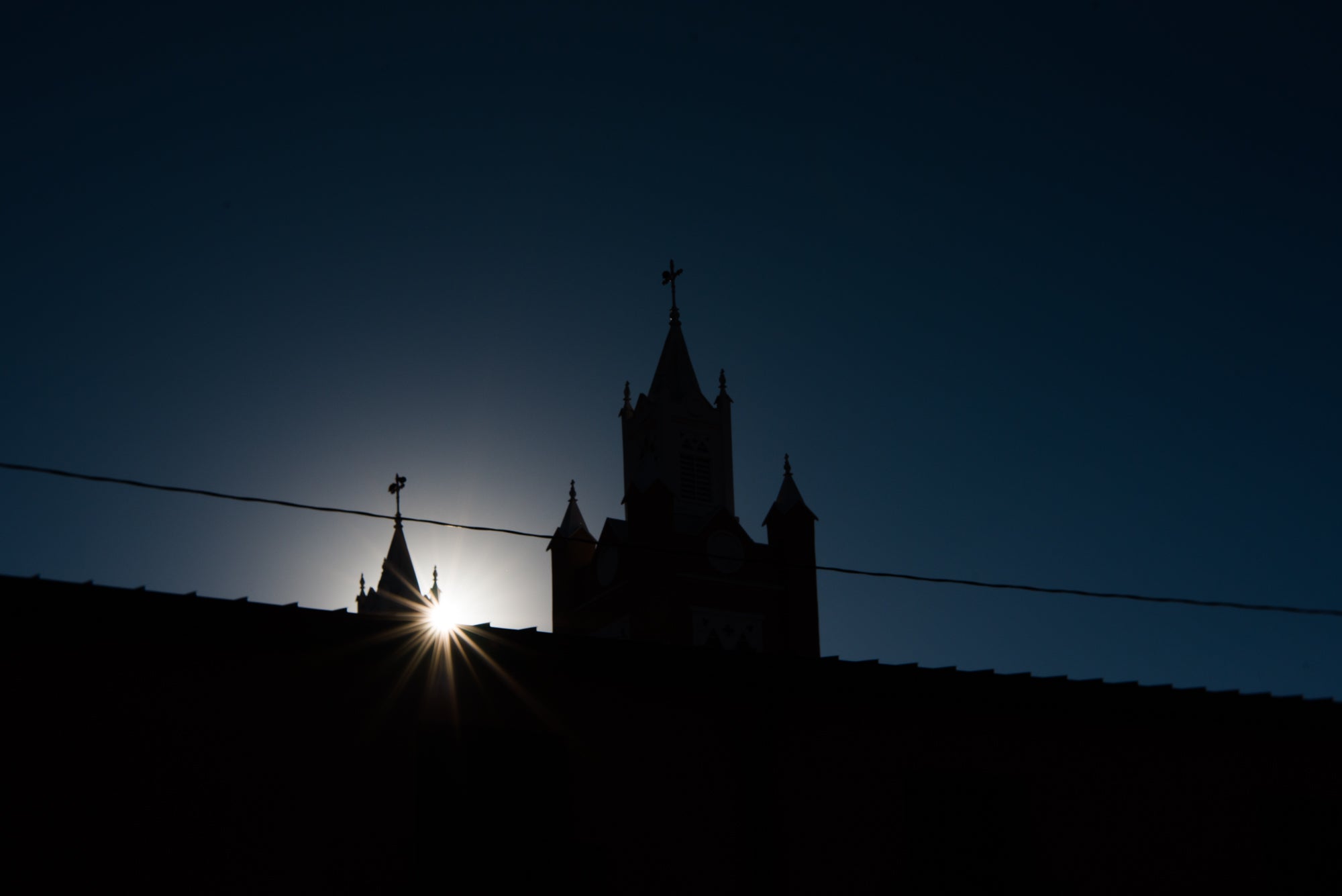 Sun rising over old town Albuquerque castle silhouette featured photos