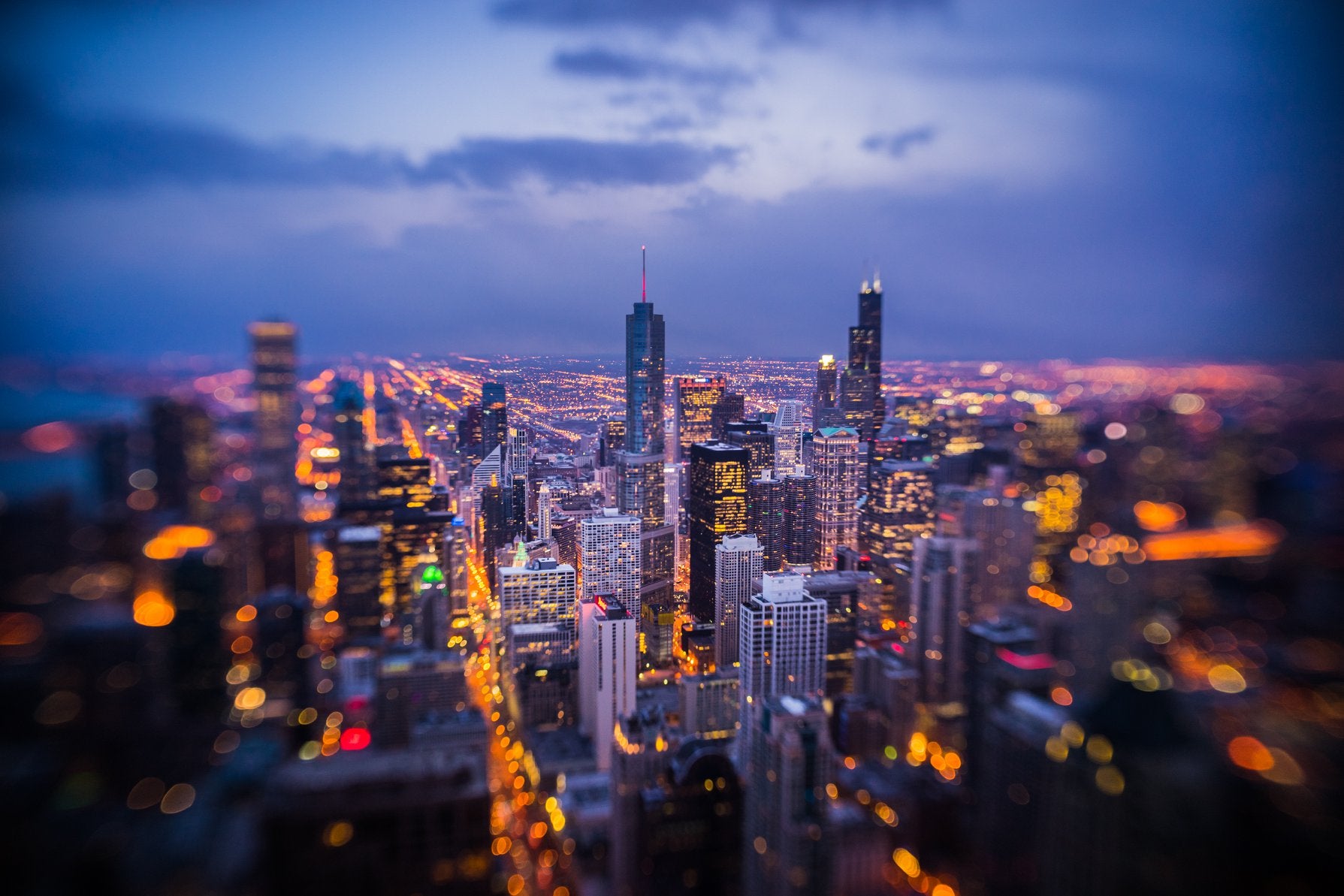 chicago city skyline at night bright city lights blue sky lensbaby featured photos